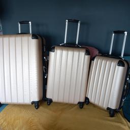 3 suit cases good condition few little marks nothing much