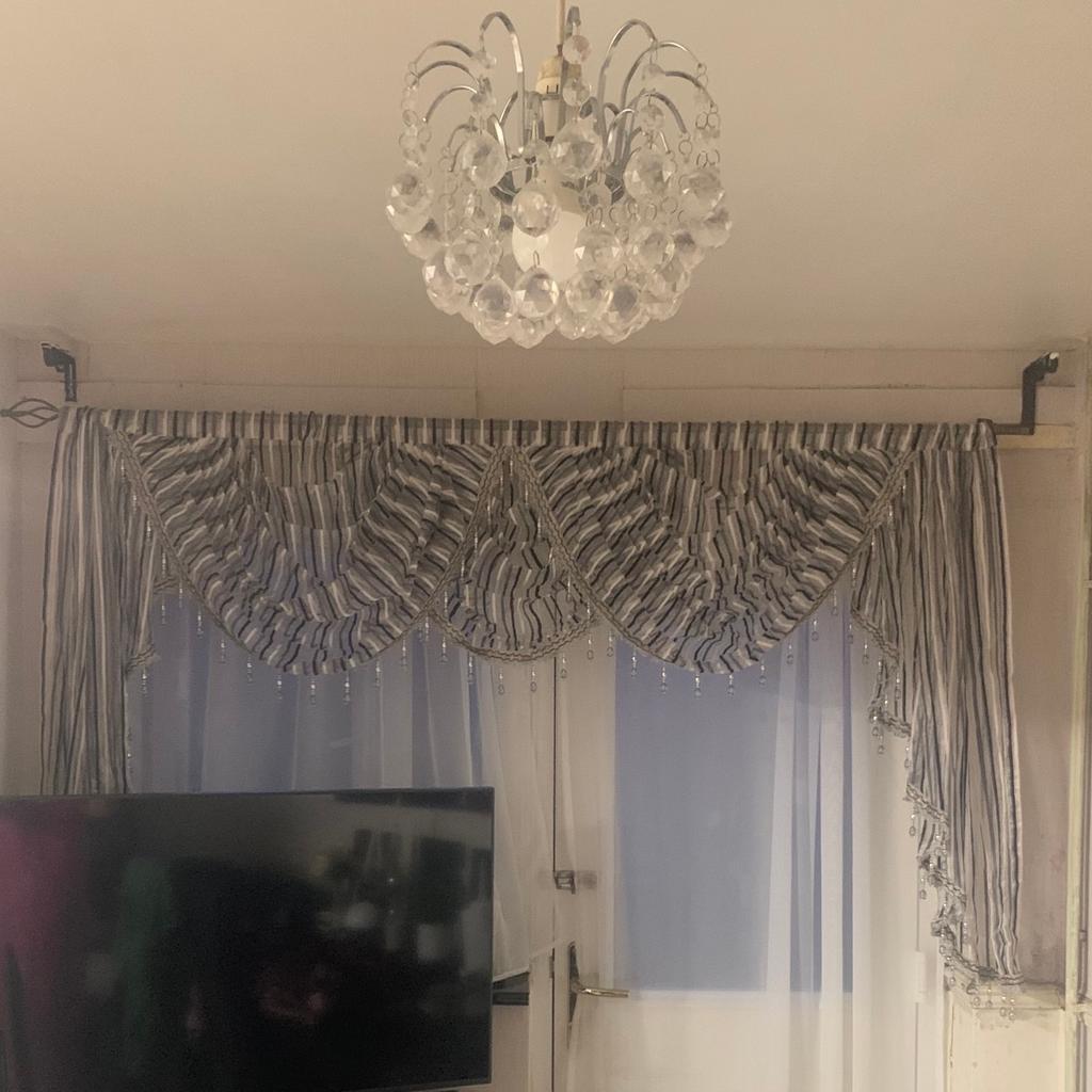 Valances curtains Black and white colour. Condition New. Never used.stripe design. Height 50 to 110cm .Width 205cm