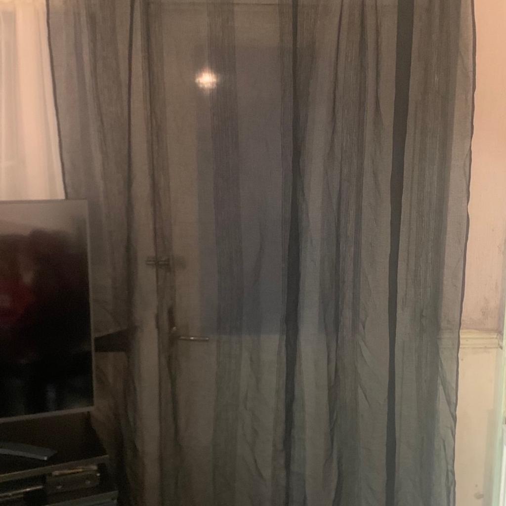 Black colour two pieces curtain. Height 200cm and width 70cm.simple and light