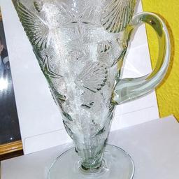 Carved Green Triangle Handmade Glass Pitcher Jug with Sea Shells and Stars.
Great for juices, milk, or any cold drinks and looks impressive in a display cabinet.
Please note there is not an option to mark colour as clear on this platform, but as the glass has a green tinge to it, I have marked as green.
Measurements: 27 cm high, base diameter 12 cm and top diameter is 15 cm.
Collection from Harlington, between Hayes and Heathrow with cash payment on collection.