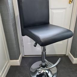 very comfortable, no damage gas lift and swivel.
black faux leather with chrome base