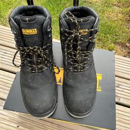 DEWALT steel toe caps in black only been worn. A few times to break mean size 10 set a picture with the rest of the details.