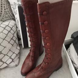 Brand new long brown pixie boots brought but never got round to wearing them , lovely soft leather
size 5/38
pick up only from SE3