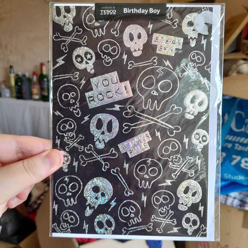 ■ PRICE: £3

■ CONDITION: NEW
▪ Still in cellophane

■ INFO:
▪ Envelope included
▪ Inside message reads: 'Have a great birthday', in capital letters
▪ Skull + bones on the front
▪ Colour is black and silver, with some of it being slightly shiny
▪ Approx 15cm in height
▪ Bought from Tesco

---

■ IMPORTANT:
▪︎ Selling due to no longer needed
▪ Cash on collection

---

Tags: hyde tameside north west salford ancoats stockport bolton reddish oldham fallowfield trafford bury cheshire longsight worsle