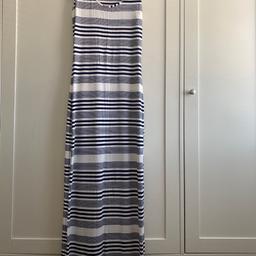 Maxi dress size 8 in excellent condition 
Stretch material 
Navy blue and cream 
From pet and smoke free home