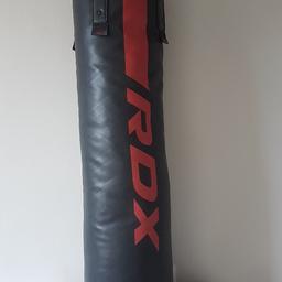 Heavy 4ft punchbag by RDX, with hanging chains. 34 lbs. Excellent condition. Buyer collects. Please use Shpock to correspond.
