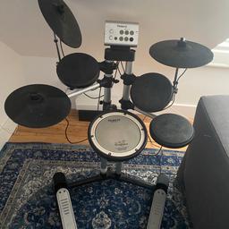 Entry level electronic drum kit great for beginners.

Includes hi-hat, crash and ride cymbals, 3 toms, snare, kick and hi hat pedals. All attached to a fixed rack. Supports headphones/audio out as well as audio in so you can plug your phone in and play along to music. Has a few drum kit styles and a metronome. Can also include drum sticks if you need them. 

I got this off another Shpock user about a year ago so it is fairly used. It’s served me well but I have since decided to upgrade to a new kit now that I am committed to playing! 

Collection from N4 Harringay Green Lanes. PLEASE state in your message what date and time you can collect. 

Kit is fully disassembled for transport. It’s not that heavy, so if you don’t have a car you could quite easily take it on public transport in a couple of sturdy bags.