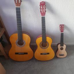 3 guitars big medium and small in really good condition