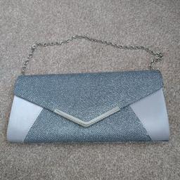 New with tags,I includes chain for shoulder. two tone sparkly clutch bag
