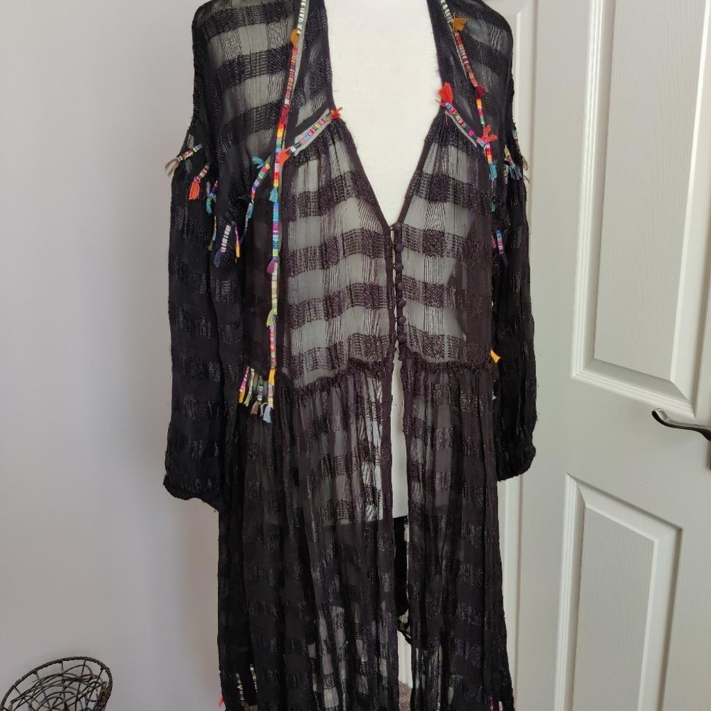 ladies Zara dress/jacket only used once it's says on label size small but it can fit size large aswell .