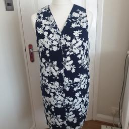 Two dresses one pure linen from next. black size 16 with 2 front pockets. 1 navy and white pattern. from Matalan size 16. linen blend. with 2 side pockets. Never been worn.£5 each