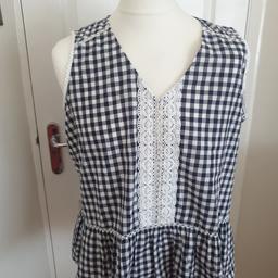 Black and white gingham sleevless top. lovely and cool. size 18. nice detail to front.