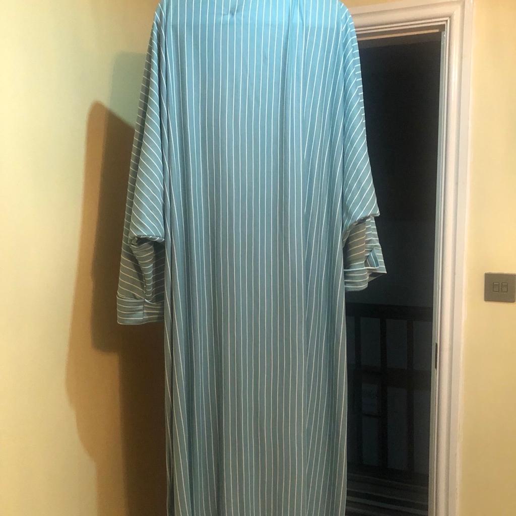 Beautiful open kimono worn for 1 hour only .will include a free scarf which is used.size 56 .can wear it with a white slip or any colour you prefer .striped kimono open can also wear a belt with it