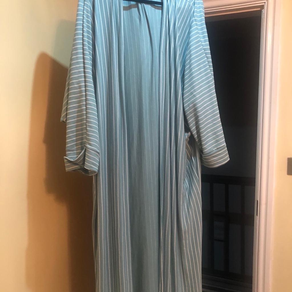 Beautiful open kimono worn for 1 hour only .will include a free scarf which is used.size 56 .can wear it with a white slip or any colour you prefer .striped kimono open can also wear a belt with it