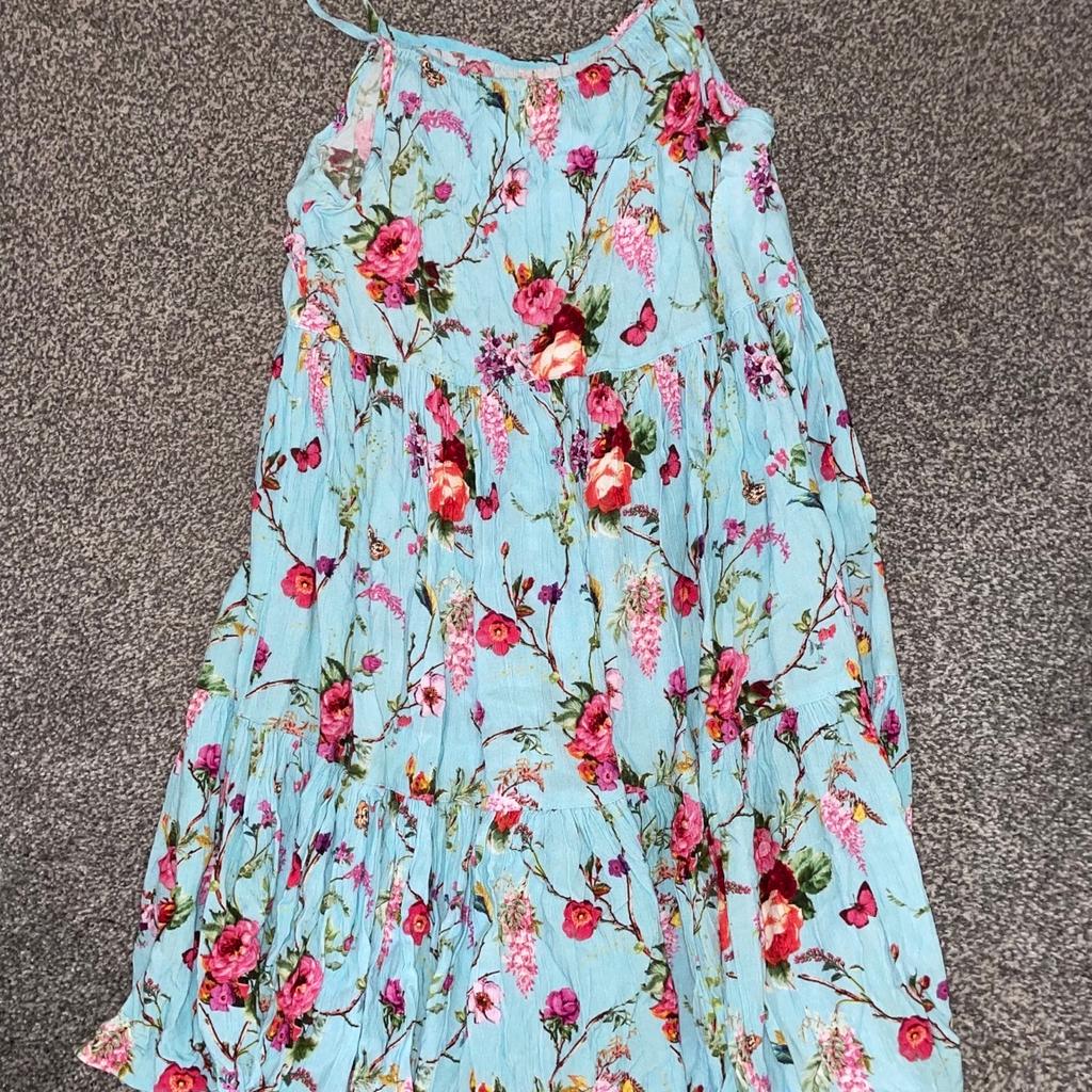 Wore once or twice. Beautiful strappy summer floaty dress in great condition collection