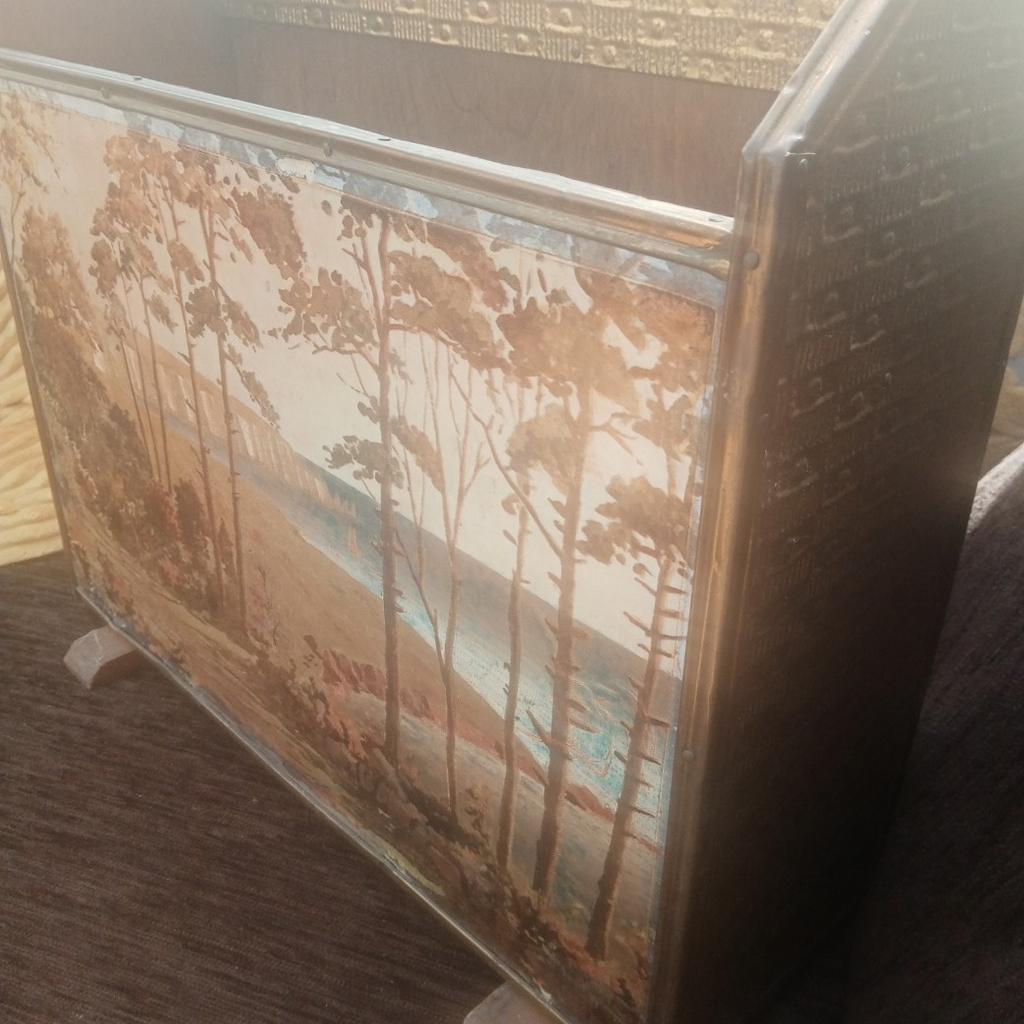 Vintage magazine rack - wood & brass, with decorative scene on the front. Unusual with design, as they are usually all brass.
Old, so in used condition with some age related marks and wear. This is reflected in the price. It measures approx 1ft 3 inches wide x approx 1ft 1 inch high x approx 5 inches deep. Collection only from Stourbridge.