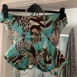 Leopard design green and black brown would fit a size 16/18 very clean home no pets either 