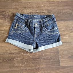 Nice summer denim shorts from New Look in size 14 years old. In a good condition besides a green smudge