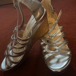 Brand new 
Silver wedges 
Wide fit 
Size 6