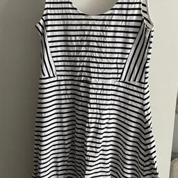 White with black stripes, size 18/20, great condition!