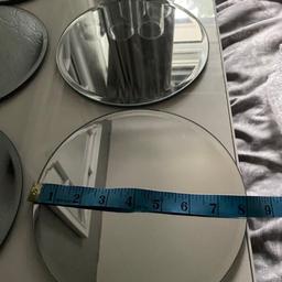 6 mirror plates. 8”. Have pads on the base so they don’t scratch anything 

Collection from S14