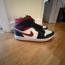 Black / red and white Jordan trainers . Worn but lots of life left. 
Uk size 7