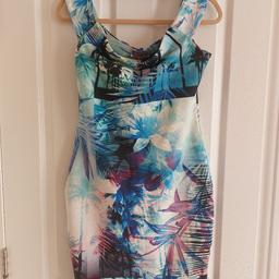 *Can be dropped off at Asda Hypermarket Watford*

Beautiful tropical blue shoulder sleeves mini dress in excellent condition. Made of stretchy fabric.
Price is fixed. Non negotiable. More lipsy dresses are available on my page for same price, same size.