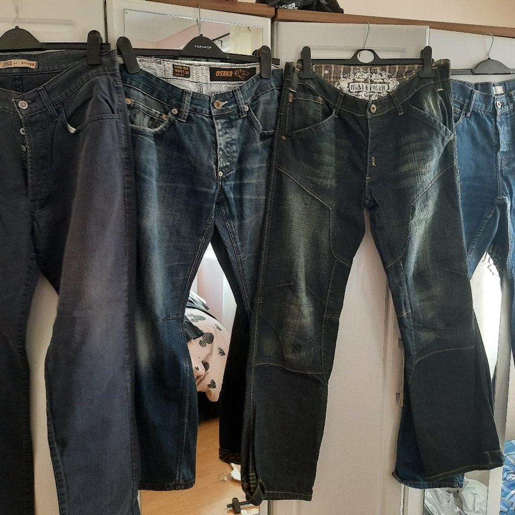 large selection of mens clothing different sizes, 5 pairs of jeans, 13 shirts, 3 jumper/sweatshirt, 3 pairs shorts. all neamed items, tom wolf, Next, burtons, smith &jones, fire trap, teddy Smith, Henley, levi, Oscar tiger, peter worth, fuck,quick silver ect. all in new condition or never worn. £40 no offers