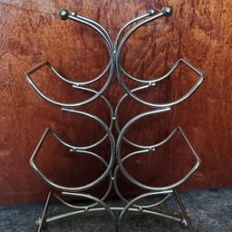 Used bottle rack.
Colour silver
