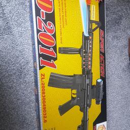 TD 2011 Super action gun. Opener but never played with. just needs 3 x AA  batteries. Pick up hx2