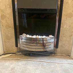 Like new Electric fire heater 
Rarely used like new condition
