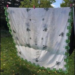 Beautiful vintage embroidered tablecloth . So beautiful this is large tablecloth would even fit over a sofa . Green florals with cut out details and lots of embroidery . Not seen another like this . So lovely on a table . Great condition