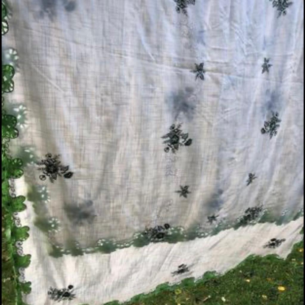 Beautiful vintage embroidered tablecloth . So beautiful this is large tablecloth would even fit over a sofa . Green florals with cut out details and lots of embroidery . Not seen another like this . So lovely on a table . Great condition