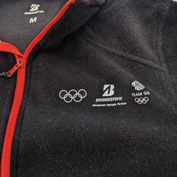 Mens Medium Original Bridgestone Worldwide Olympic Partner Tokyo 2020 black/red  fleece, worn a few times but still in good condition. side pockets have been patched up they had holes. but still fully working pockets.