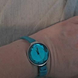 blue watch. needs a new battery.