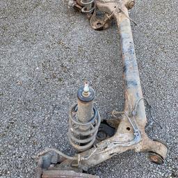 Honda Jazz mark 1 rear axle with calipers and springs. Shock absorbers included but not tested
