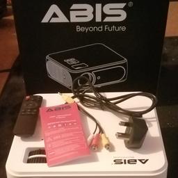 Abis HD8k HOME Edition Cinema Projector. Brand new never been used I only took it out box to take pictures of it. It comes with all power leads, remote control and instruction book.... It cost me £300 so NO OFFERS OR TIME WASTERS PLEASE AND I DON'T FALL FOR SCAMS 