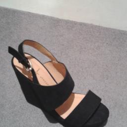 Black wedge sandals. faux suede adjustable heel straps brand new size 4.