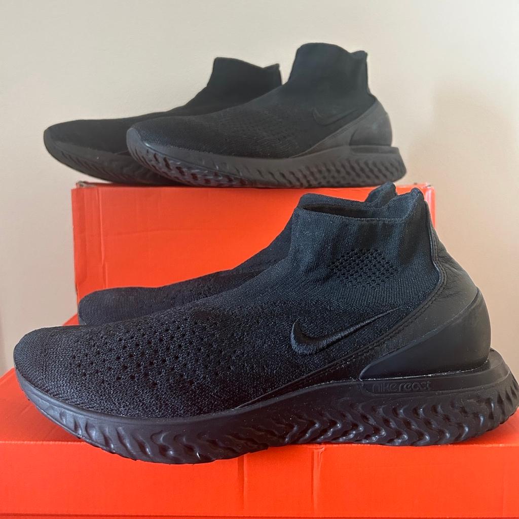 nike rise react flyknit.

Triple black

Perfect condition

Size 8.5 available

(Size 10 *SOLD*)

*Both items worn outside balcony in photo shoot*

Please feel free to request selective pictures of this item

Super comfortable

Very difficult to find in triple black, a well sought after Nike footwear, a very rare colour in an average foot size to purchase today. A real top footwear to own. Triple black fly knit Nike reacts
