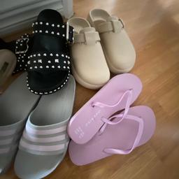 5 pairs. Lilac flip flops and cream croc type 
Sliders not been worn.
Adidas sliders 
High heels 
Black studded sliders 
All size 5
