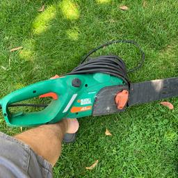 Black and decker electric chain saw. Works fine but will need a new chain or sharpening