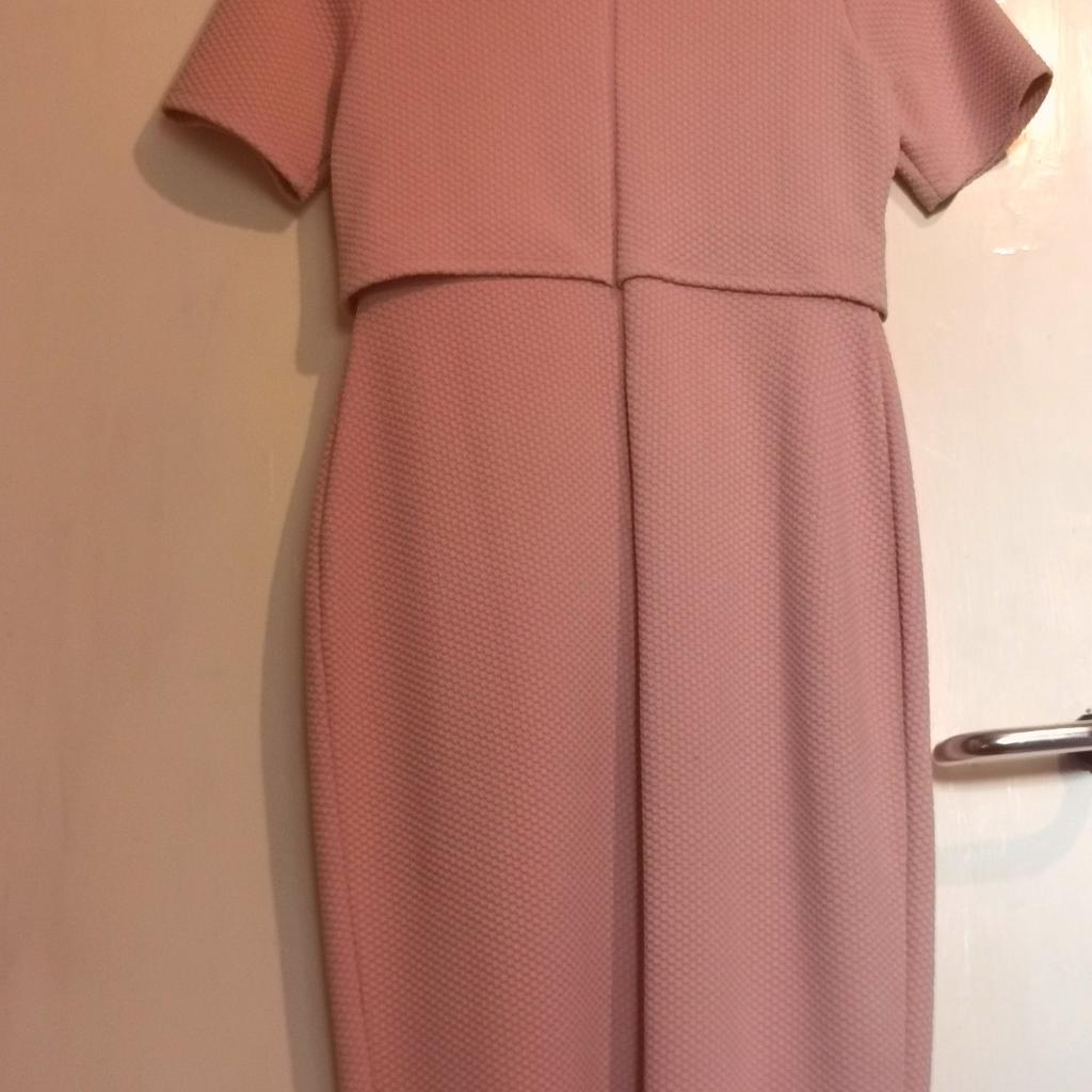 PICK UP ONLY!
This a formal dress ( wedding guest dress originally)
only warn once, not my style and size anymore
great quality no holes basically like new.
has a slit at the front
 it's not stretchy material.