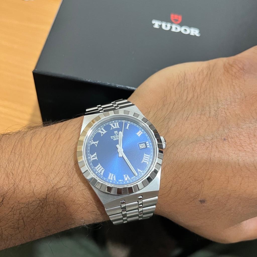 Tudor royal date 38mm 2022 stainless steel. Blue dial with roman numerals. 100 meters water resistant.
From Goldsmiths purchased June 2023. Box and papers and tags. Full links included. 2 year warranty card.
A true luxury time piece.

Prefer cash on collection or bank transfer. Otherwise delivery will be first class recorded from post office.

No time for Paypal scammers