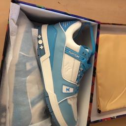 Genuine dress trainers, New, in box, never worn, received as a birthday gift, the blue is a little to pale for me. Stunning trainers, cost over £850.