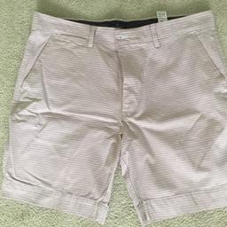 M&S blue harbour men’s shorts,in good condition only worn a couple of times, salmon pink with white stripes,side pockets and two buttoned pockets at rear , from a smoke and pet free home cash and collection only please