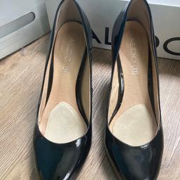 Excellent condition with added cushion Aldo patent black heels. Pick up only