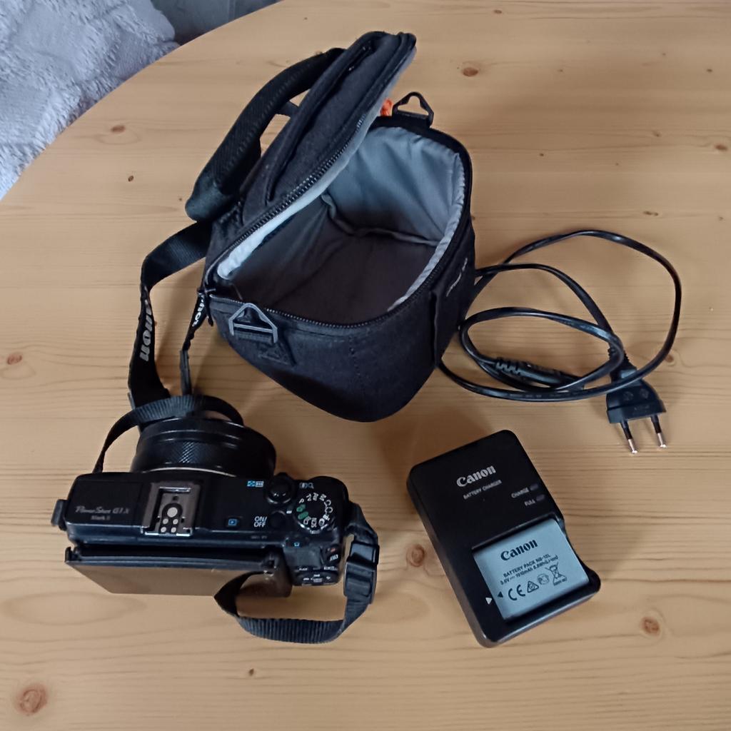 Kamera mit Tasche und Ersatzakku
NP 1000€