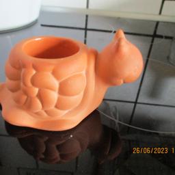 Biete Teelichthalter von Partylite
Terracotta Schnecke