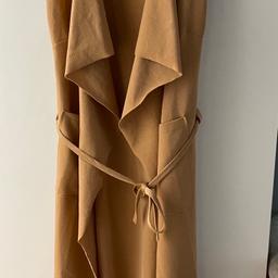 Lovely light and long waterfall sleeveless jacket/cardigan, with belt. Size S/M, great condition!