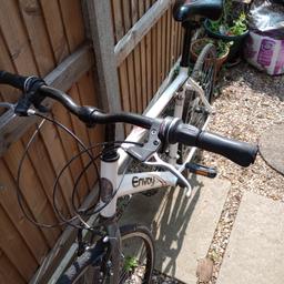 Apollo Envoy White Mens Hybrid Sport Bike 21" Frame

Overall second hand condition ok and working. But sat unused so may require adjustments on brakes and gears.

As pictured wear on grips, seat, thin profile tyres not like mountain bike like racer bike